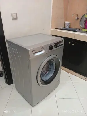 a washing machine in a kitchen with a sink at Appartement familial à Marrakech in Marrakech