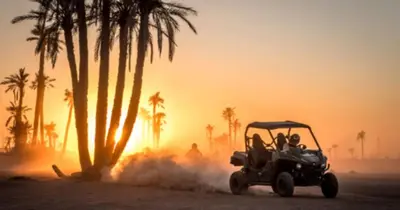 an atv driving on the beach with palm trees at Comfortable stay - Marrakech style in Marrakech