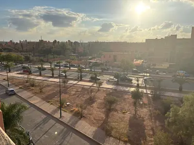 a view of a city with a street with cars at Menara Garden Gueliz Marrakech in Oulad Akkou