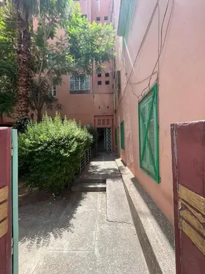 an alley way between two buildings with a door at 3Br in heart of Marrakech 15min from downtown in Marrakech