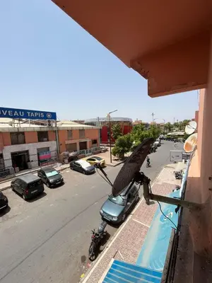 a helicopter parked next to a building with a parking lot at 3Br in heart of Marrakech 15min from downtown in Marrakech