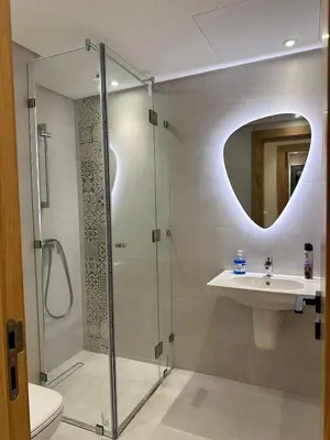 a bathroom with a shower and a sink at Marrakech Mood in Marrakech