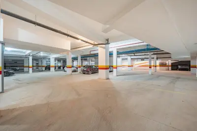 an empty parking garage with cars parked in it at Le Grand Chic in Marrakech