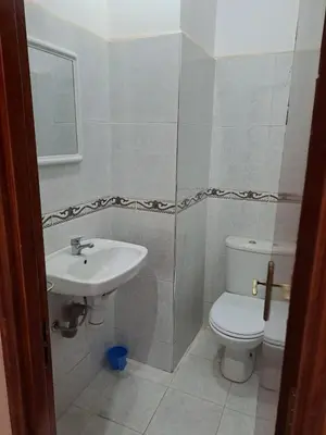 a bathroom with a sink and a toilet at Happy space in Marrakech