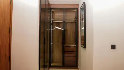 a glass walk in shower in a room at Villa Nobu - Architect-designed villa with pool in Douar Bellouk