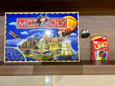 a monopoly board game with a lego minifigure at 10 min from Stadium AFCON Green Table Loft in Marrakech