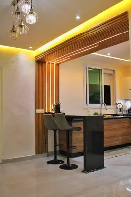 a kitchen with a table with a chair in it at apparemment 35 in Marrakech