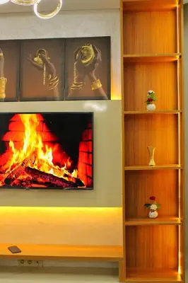 a fireplace in a living room with a fire place at apparemment 35 in Marrakech