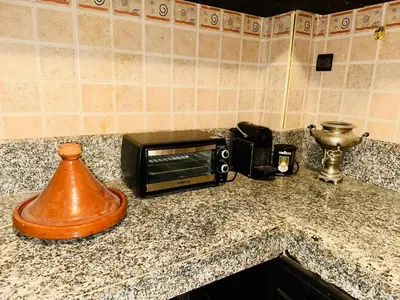 a toaster oven sitting on top of a counter at B&B Lina Stay Marrakech in Marrakech