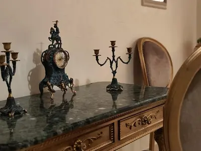 a table with a clock on top of it at Nilia in Marrakech