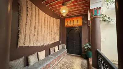 a hallway of a house with a door at Riad Lana Marrakech - Dar el Bacha Luxury Suites in Marrakech