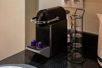 a coffee maker sitting on top of a counter at Gueliz Signature Terrasse and Comfort in Marrakech