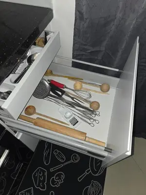 a drawer filled with lots of kitchen utensils at Quiet and comfortable apartment in Marrakech