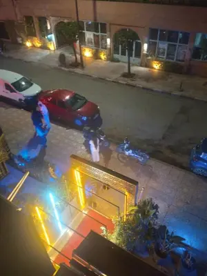 a car parked on the side of a street at night at chambre Economic Gueliz in Marrakech