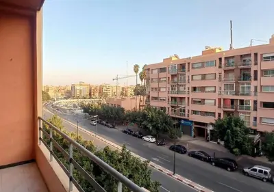 a view of a city street from a balcony at Appart zénith in Marrakech