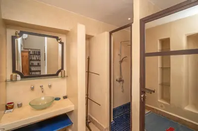 a bathroom with a sink and a shower at Villa DarJ in Marrakech