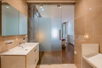 a bathroom with a sink and a shower at Sunny Getaway with Pool Access & Private Yard in Marrakech