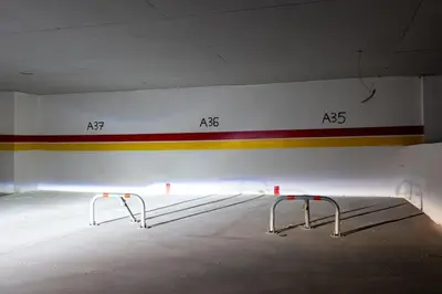 an empty parking lot with painted on the wall at palace studio gueliz et proche gare central in Marrakech