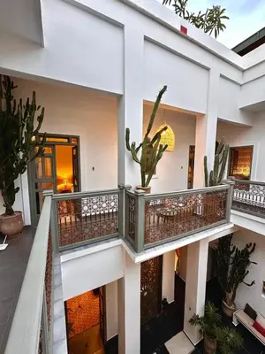 an image of a house with a balcony at Riad 191 - Maison privée, spa & piscine in Marrakech