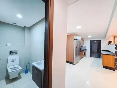 a kitchen with a sink and a toilet in a room at Burj Malak Duplex Villa Serenitas in Marrakech