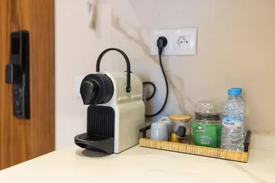 a coffee maker sitting on top of a counter at grand studio hypercentre de marrakech et proche gare in Marrakech