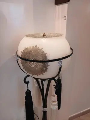a cake sitting on top of a stand at Kasbah Bastoff in Marrakech