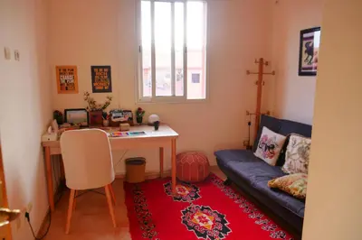 a living room with a couch and a table at Calm Spacious Family Apartment Close To Coty in Marrakech