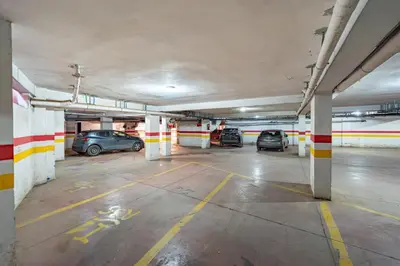 an empty parking garage with cars parked in it at Cocon Ocre Pool and Balcony in Marrakech