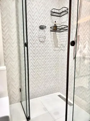 a bathroom with a shower with a basketball hoop at Majorelle Luxury Studio in Marrakech