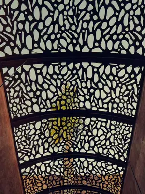 a gold and white pattern on a glass door at LA VILLA 58 - Ecolodge - Marrakech in Marrakech
