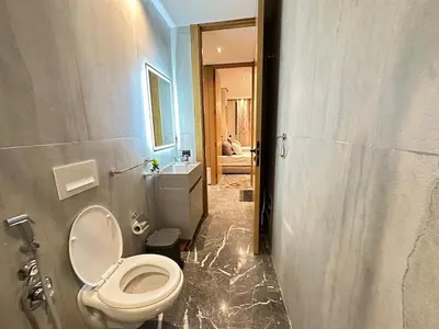 a bathroom with a white toilet and a sink at Apartment in heart of Marrakech near Guéliz & Medina in Marrakech