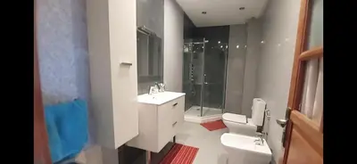 a bathroom with a toilet and a sink and a shower at Atlantic Villa in Marrakech