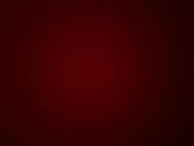 a dark red background with a dark red gmaxwell at Appartement bien préparée in Marrakech