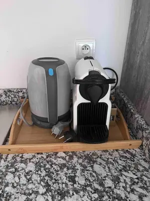 a coffee maker and a blender on a wooden shelf at Modern quiet studio Close to Guéliz in Marrakech