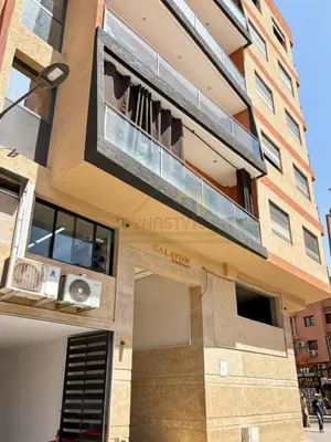 a modern apartment building with a balcony at Séjour chic au cœur de Marrakech in Marrakech