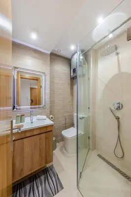 a bathroom with a shower and a sink and a toilet at Studio élégant et paisible au cœur de Marrakech in Marrakech
