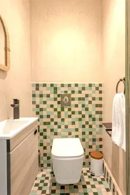 a bathroom with a toilet and a sink at Riad Garden View in Marrakech