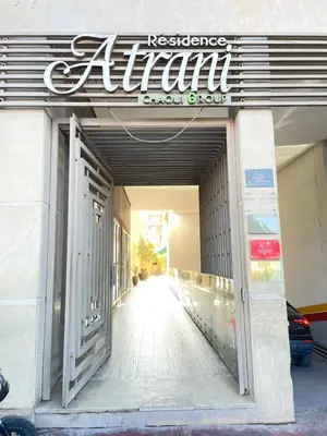 an entrance to a showroom with a sign on it at Studio Premium au Cœur de Guéliz in Marrakech