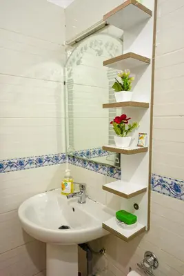 a bathroom with a sink and a mirror at apartment in Hay mabrouka gueliz Marrakech in Marrakech