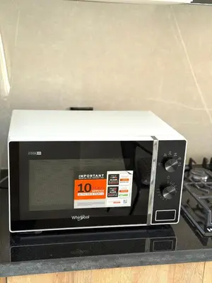 a microwave oven sitting on top of a counter at Stylish and cozy accommodation for families in Marrakech