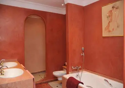 a bathroom with a tub and a sink and a toilet at Private villa Marrakech in Marrakech