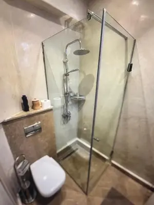 a shower stall with a toilet in a bathroom at Urban Escape in Marrakesh in Marrakech