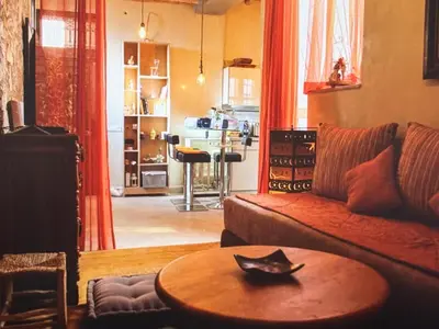 a living room with a couch and a table at Urban Escape in Marrakesh in Marrakech