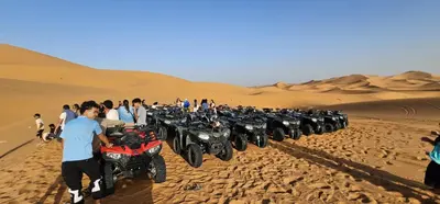 a group of motorcycles parked in the desert at Menara Airport Transfers in Marrakech