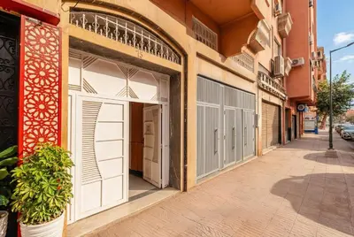 an empty street in a city with buildings at Modern & Cozy Apartment 2 min Carré Eden Guéliz in Marrakech