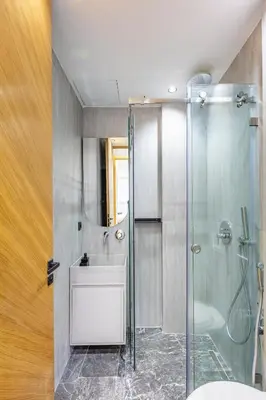 a bathroom with a shower and a sink at Modern apartment, design and cozy relaxing stay in Marrakech