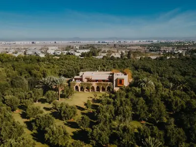 an aerial view of a house surrounded by trees at Casa Memoria in Marrakech