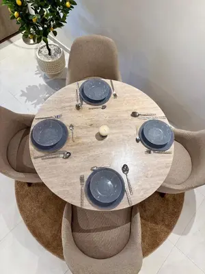 a wooden table with four blue plates and chairs at Luxury Town Center Gueliz 2 Chambres Parking Grande Terrasse in Marrakech