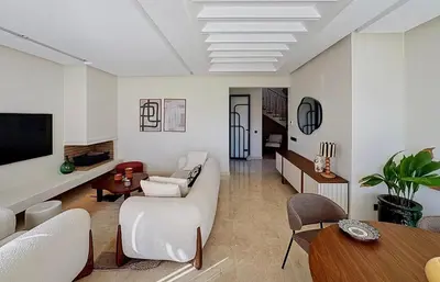 a living room with a couch and a table at Abwab in Marrakech