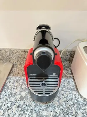 a red blender sitting on top of a counter at Elegant apartment with pool, highly desirable area in Marrakech